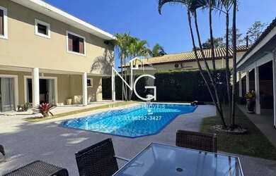 Imagem: A casa em condomínio possui 3 Dormitórios, 4 Banheiros, 5