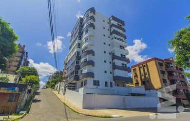 Imagem: O apartamento possui 3 Dormitórios, 1 Banheiro, 2 Vagas na