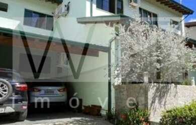 Imagem: A casa possui 5 Dormitórios, 5 Banheiros, 4 Vagas na garagem