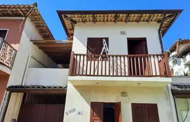 Imagem: A casa possui 2 Dormitórios, 2 Banheiros, 1 Vaga na garagem