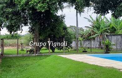 Imagem: A casa possui 3 Dormitórios, 3 Banheiros, 3 Vagas na garagem