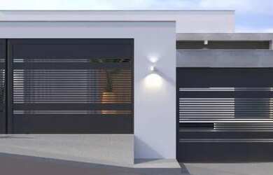 Imagem: A casa possui 3 Dormitórios, 4 Banheiros, 5 Vagas na garagem