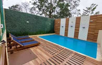 Imagem: A casa possui 2 Dormitórios, 1 Banheiro, 2 Vagas na garagem