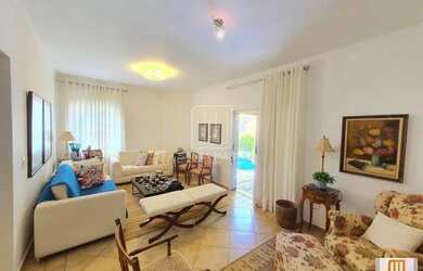 Imagem: A casa possui 3 Dormitórios, 4 Banheiros, 4 Vagas na garagem