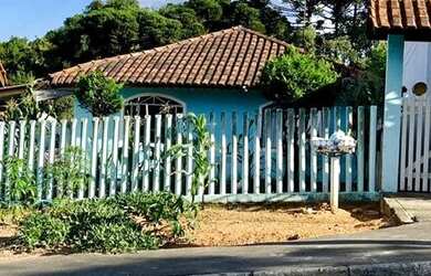 Imagem: A casa à venda possui 3 Dormitórios, 3 Banheiros, 2 Vagas
