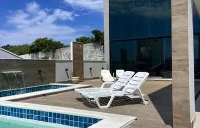 Imagem: A casa em condomínio possui 4 Dormitórios, 2 Banheiros, 2