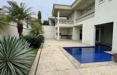 Imagem: A casa em condomínio possui 4 Dormitórios, 5 Banheiros, 5