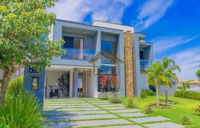 Imagem: A casa em condomínio possui 4 Dormitórios, 5 Banheiros, 5