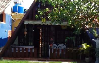 Imagem: A casa possui 3 Dormitórios e 2 Banheiros e está localizado