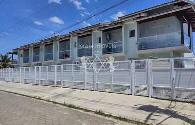 Imagem: A casa possui 2 Dormitórios, 3 Banheiros, 1 Vaga na garagem