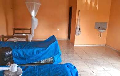 Imagem: A casa possui 3 Dormitórios, 4 Banheiros, 5 Vagas na garagem