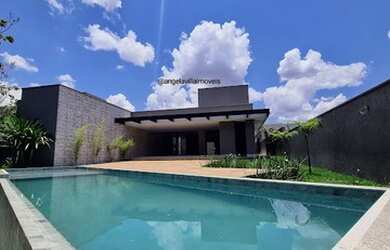 Imagem: A casa em condomínio possui 4 Dormitórios, 5 Banheiros, 4