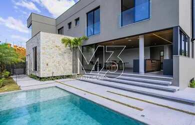 Imagem: A casa em condomínio possui 4 Dormitórios, 5 Banheiros, 4