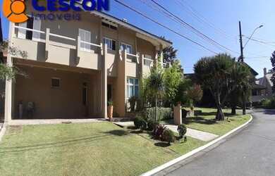 Imagem: A casa em condomínio possui 4 Dormitórios, 5 Banheiros, 5