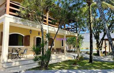 Imagem: A casa possui 5 Dormitórios, 5 Banheiros, 5 Vagas na garagem