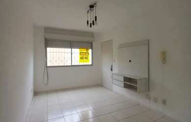 Imagem: O apartamento possui 1 Dormitório, 1 Banheiro, 1 Vaga na garagem