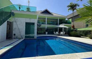 Imagem: A casa em condomínio possui 5 Dormitórios, 5 Banheiros, 4