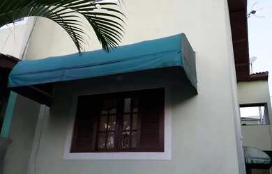 Imagem: A casa possui 2 Dormitórios, 2 Banheiros, 2 Vagas na garagem