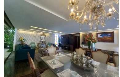 Imagem: A casa possui 4 Dormitórios, 5 Banheiros, 5 Vagas na garagem