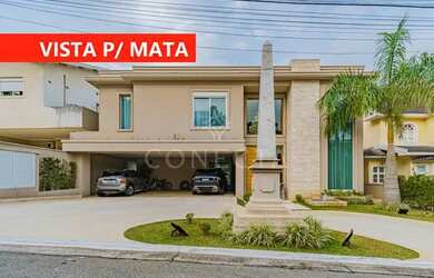 Imagem: A casa possui 5 Dormitórios, 5 Banheiros, 3 Vagas na garagem