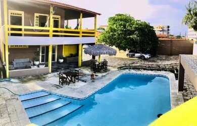 Imagem: A casa possui 5 Dormitórios, 5 Banheiros, 5 Vagas na garagem