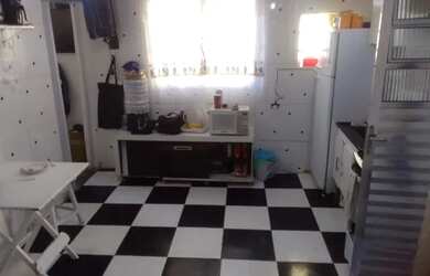 Imagem: A casa possui 5 Dormitórios, 4 Banheiros, 2 Vagas na garagem