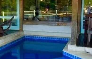 Imagem: A casa em condomínio possui 5 Dormitórios, 5 Banheiros, 5