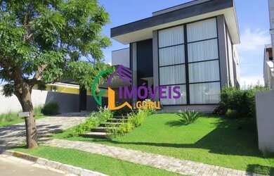 Imagem: A casa possui 4 Dormitórios, 5 Banheiros, 4 Vagas na garagem