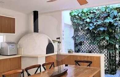 Imagem: A casa possui 3 Dormitórios, 4 Banheiros, 4 Vagas na garagem