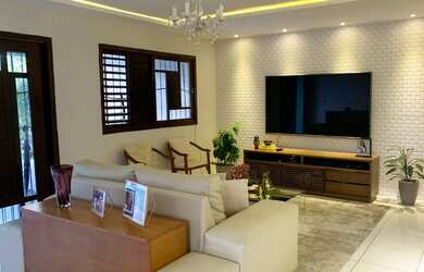 Imagem: A casa possui 3 Dormitórios, 3 Banheiros, 2 Vagas na garagem