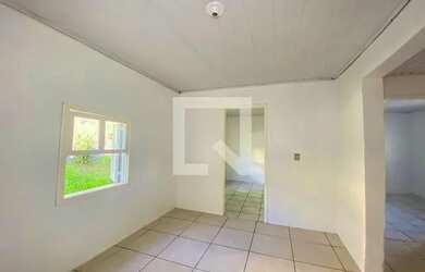 Imagem: A casa possui 2 Dormitórios, 1 Banheiro, 1 Vaga na garagem