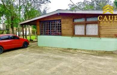 Imagem: A casa em condomínio possui 3 Dormitórios, 2 Banheiros, 2