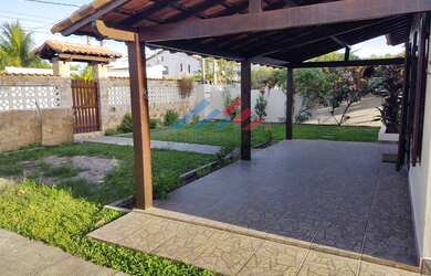 Imagem: A casa possui 3 Dormitórios, 2 Banheiros, 3 Vagas na garagem