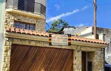 Imagem: A casa possui 3 Dormitórios, 3 Banheiros, 4 Vagas na garagem