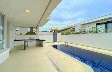 Imagem: A casa em condomínio possui 4 Dormitórios, 5 Banheiros, 4