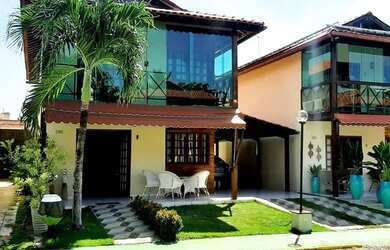 Imagem: A casa possui 4 Dormitórios, 5 Banheiros, 4 Vagas na garagem