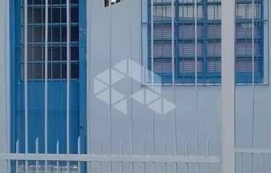 Imagem: A casa possui 2 Dormitórios, 1 Banheiro, 1 Vaga na garagem