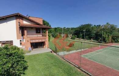 Imagem: A casa possui 3 Dormitórios, 5 Banheiros, 5 Vagas na garagem