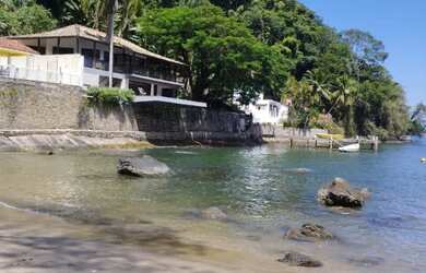 Imagem: A casa em condomínio possui 3 Dormitórios, 3 Banheiros, 600m²