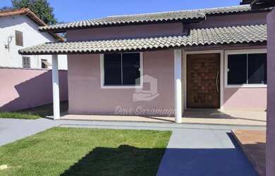 Imagem: A casa possui 3 Dormitórios, 3 Banheiros, 3 Vagas na garagem