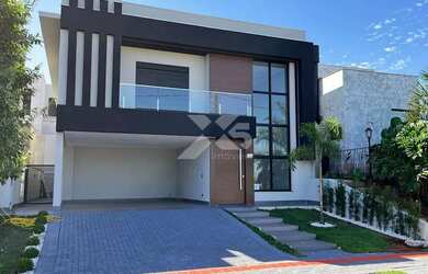 Imagem: A casa em condomínio possui 3 Dormitórios, 4 Banheiros, 2