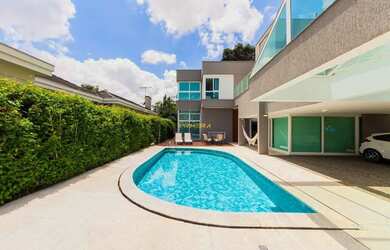 Imagem: A casa em condomínio possui 5 Dormitórios, 5 Banheiros, 4