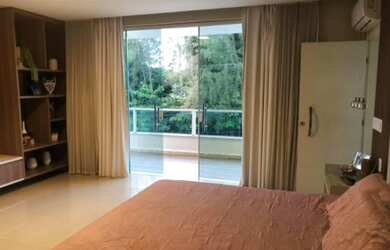 Imagem: A casa em condomínio possui 4 Dormitórios e está localizado