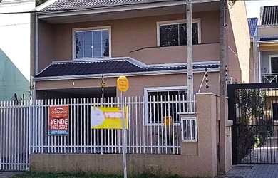 Imagem: A casa possui 3 Dormitórios, 2 Banheiros, 2 Vagas na garagem