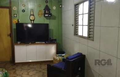 Imagem: A casa possui 3 Dormitórios, 1 Banheiro, 1 Vaga na garagem