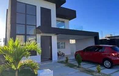 Imagem: A casa possui 4 Dormitórios, 4 Banheiros, 4 Vagas na garagem