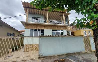 Imagem: A casa possui 5 Dormitórios, 5 Banheiros, 2 Vagas na garagem