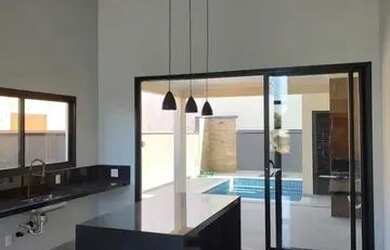 Imagem: A casa possui 3 Dormitórios, 5 Banheiros, 2 Vagas na garagem