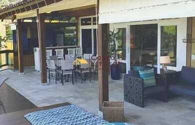 Imagem: A casa em condomínio possui 5 Dormitórios, 5 Banheiros, 4