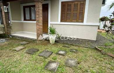 Imagem: A casa possui 2 Dormitórios, 1 Banheiro, 1 Vaga na garagem